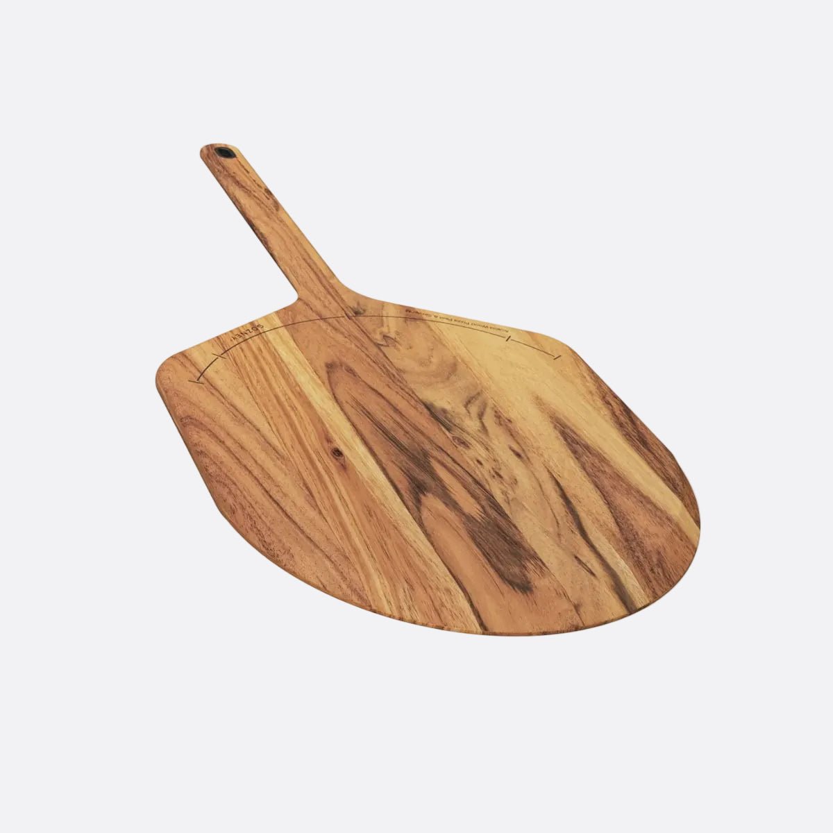 Acacia wood pizza peel with natural grain, chamfered edge, etched guides, and metal hanging loop.