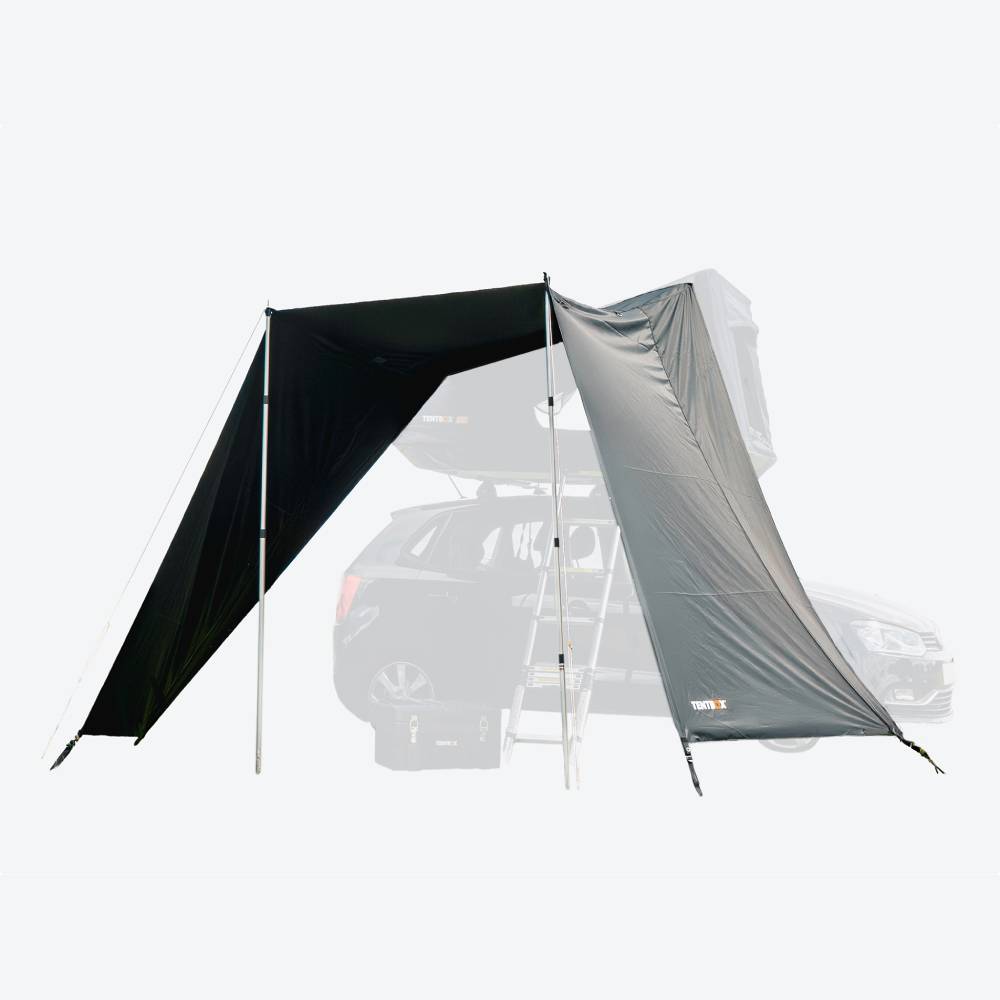 Black TentBox Go Tunnel Awning attached to a car, providing shelter with poles and side panels.