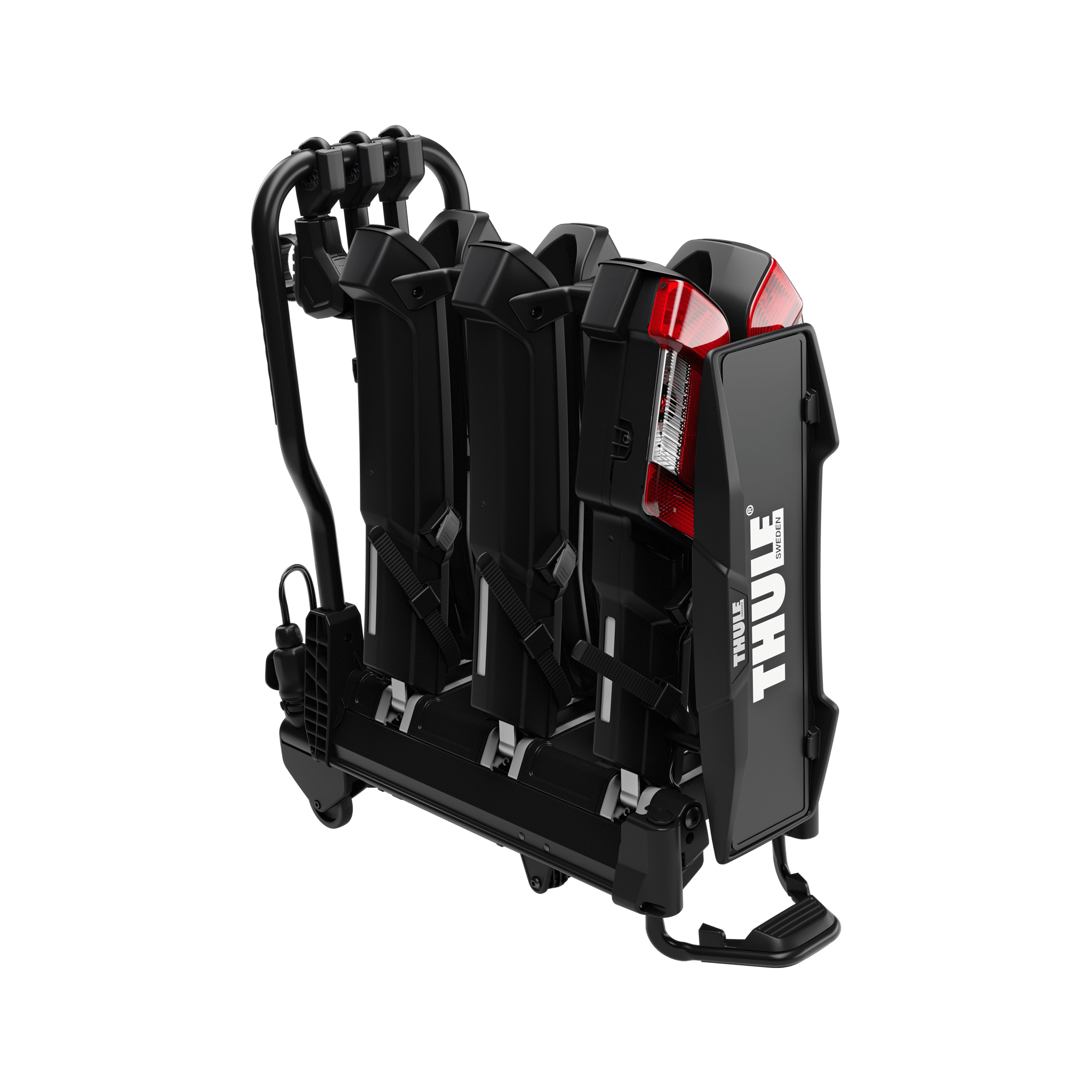 Black Thule EasyFold 3 towbar-mounted 3-bike carrier with red taillights, folded for storage.