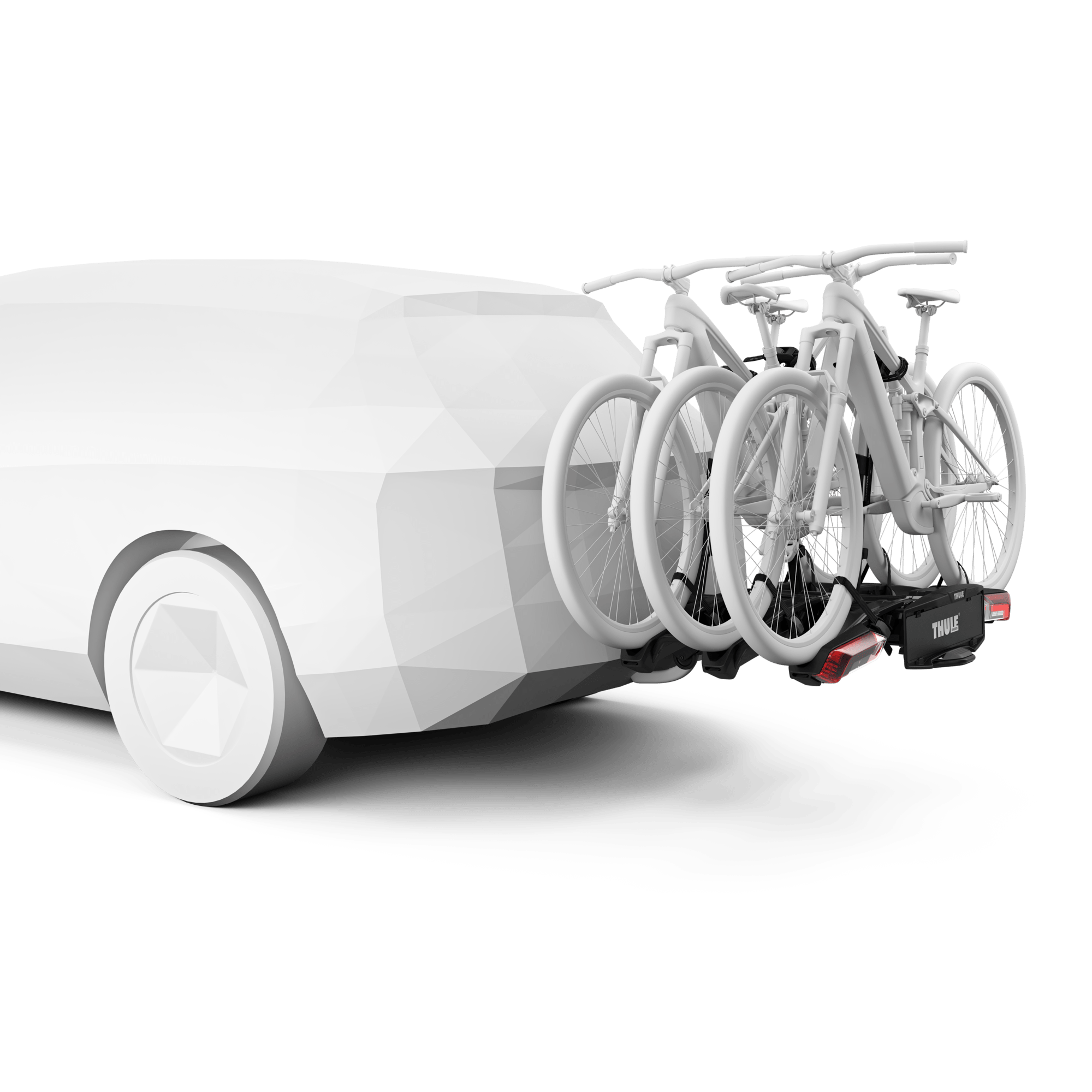 Thule Epos 3-bike 13-pin hitch rack, black, holding three white bikes on a white car.