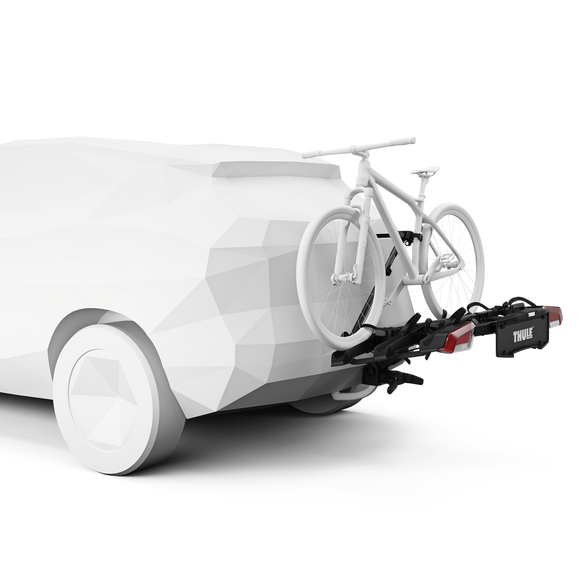 Black Thule OutPace 3-bike rack attached to a white car's hitch, holding one white bicycle.