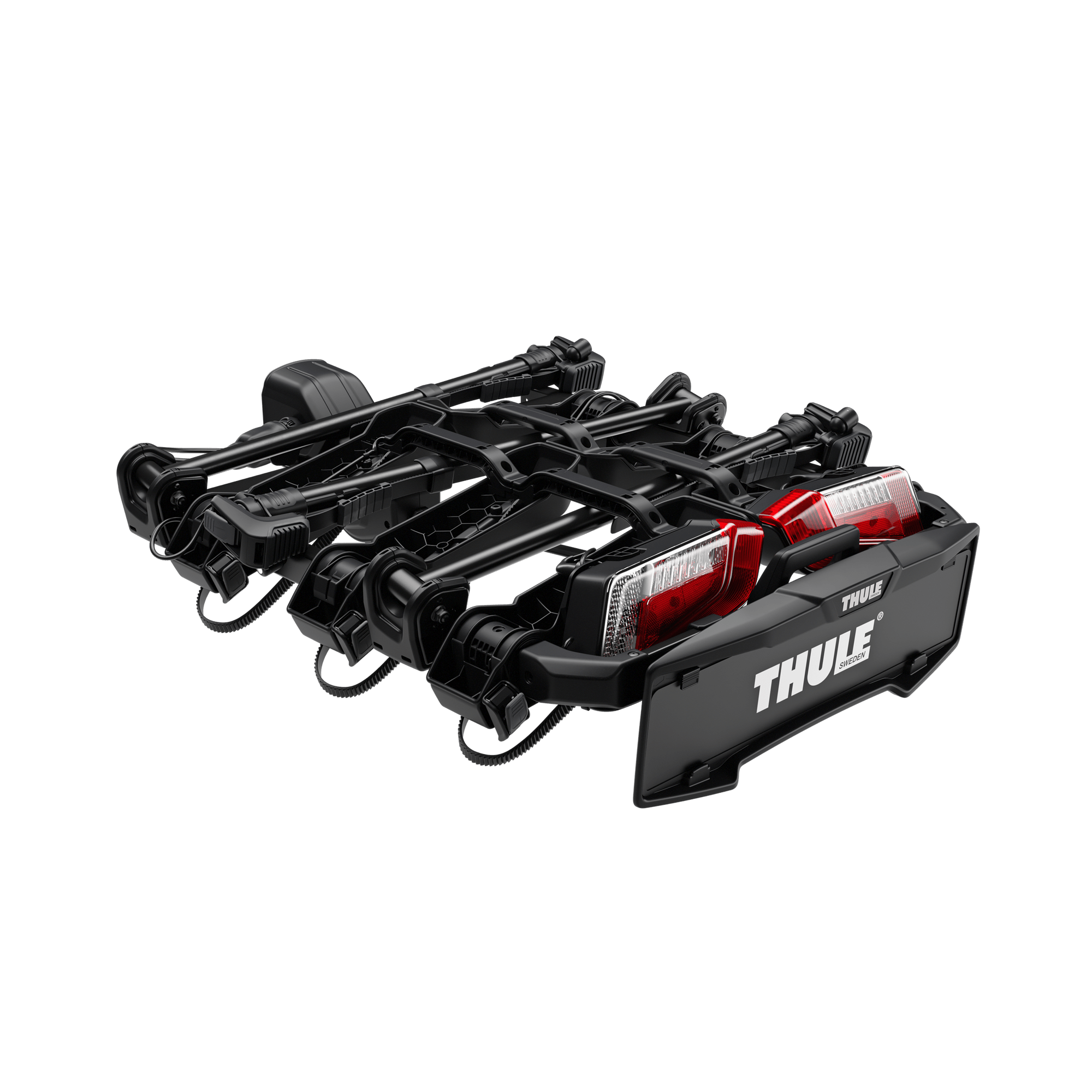 Black Thule OutPace 3-bike platform rack with red taillights and license plate holder.