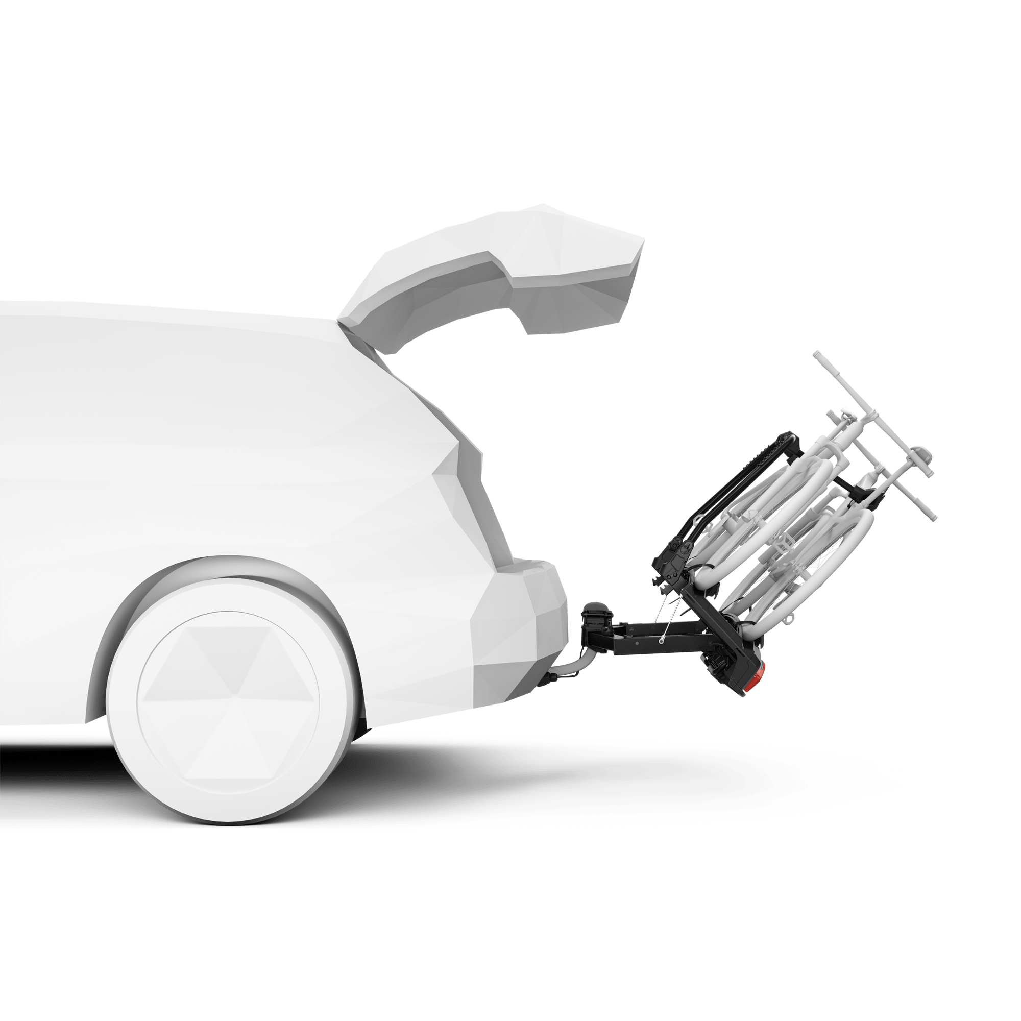 Thule VeloSpace 3 towbar-mounted bike rack in black, folded, attached to a white car's hitch.