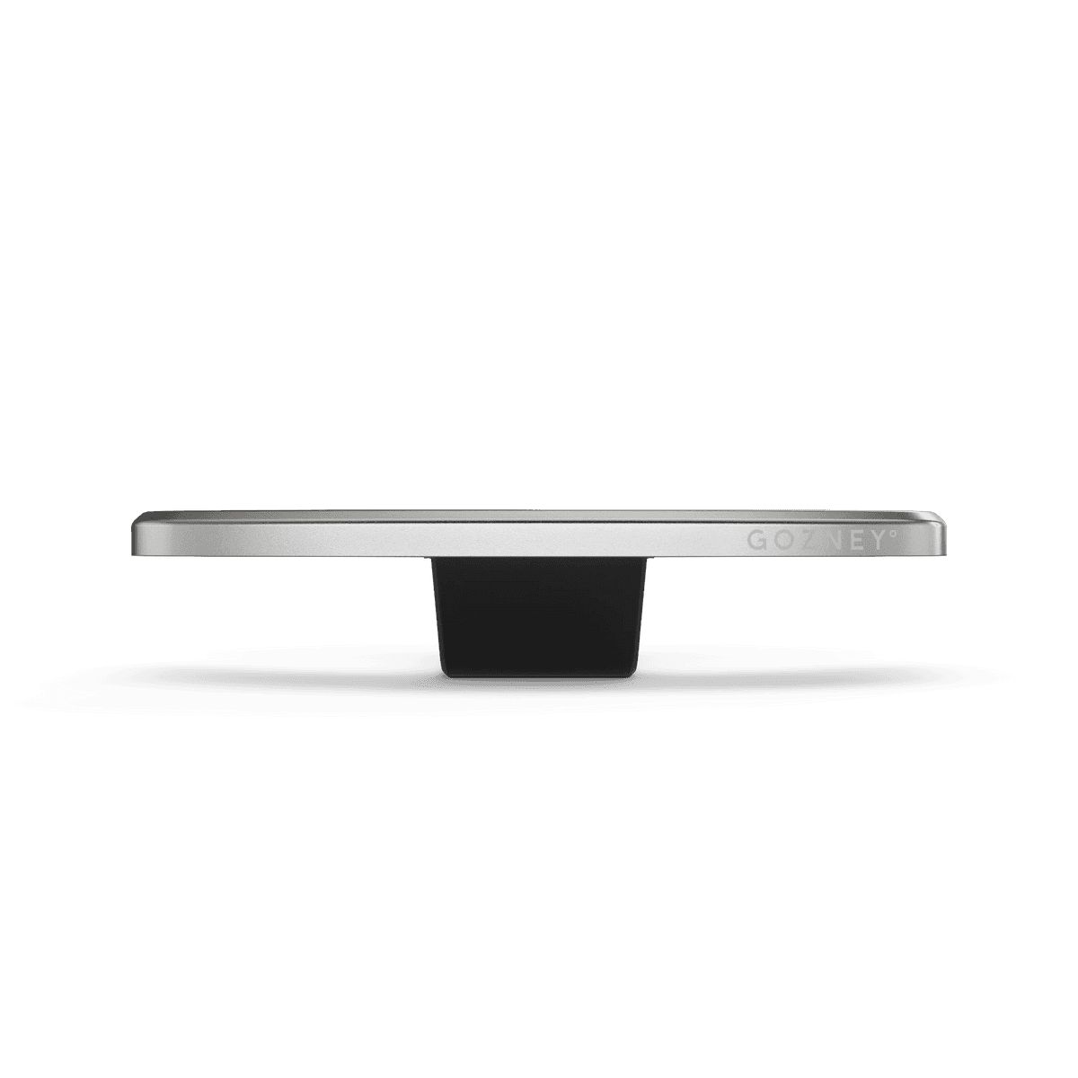 Silver Gozney Tread Mantel, a sleek, flat metal shelf with a black mounting bracket.