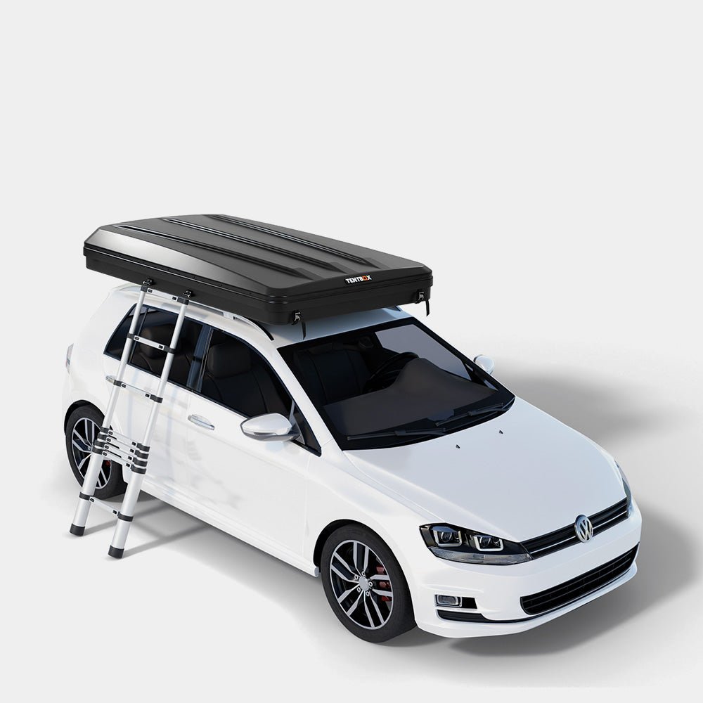 Black TentBox Classic 2.0 rooftop tent with angular matte ABS shell on a white car, with a silver ladder.