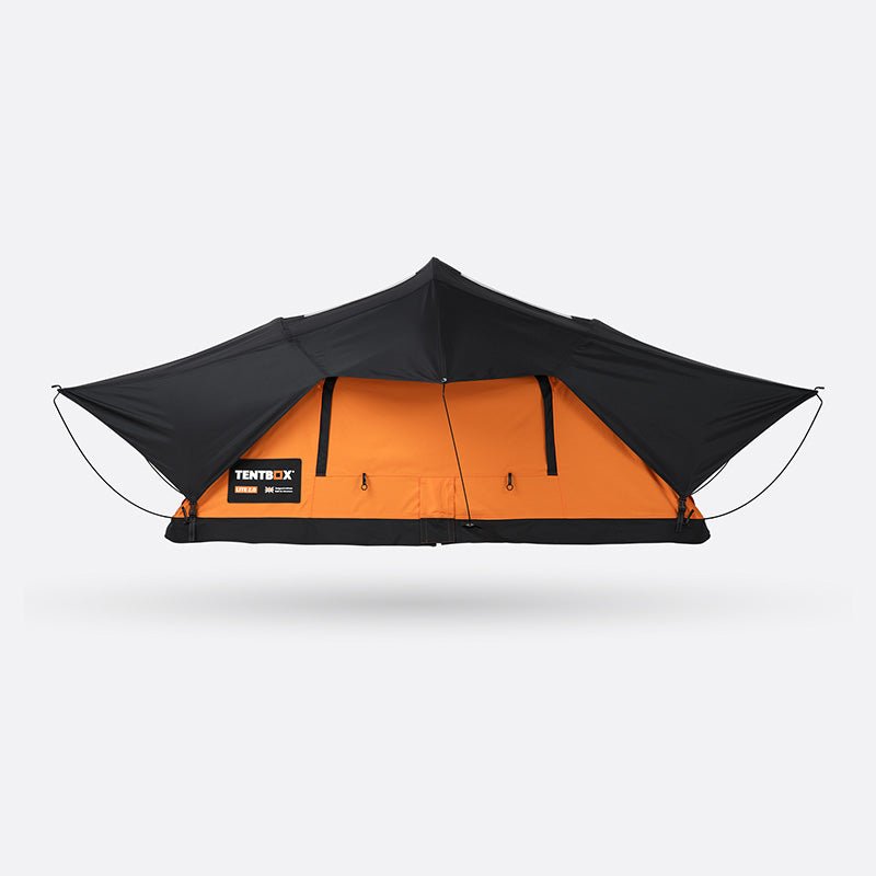 Orange and black TentBox Lite 2.0 soft-shell roof tent with new rainfly design, open and ready for adventure.