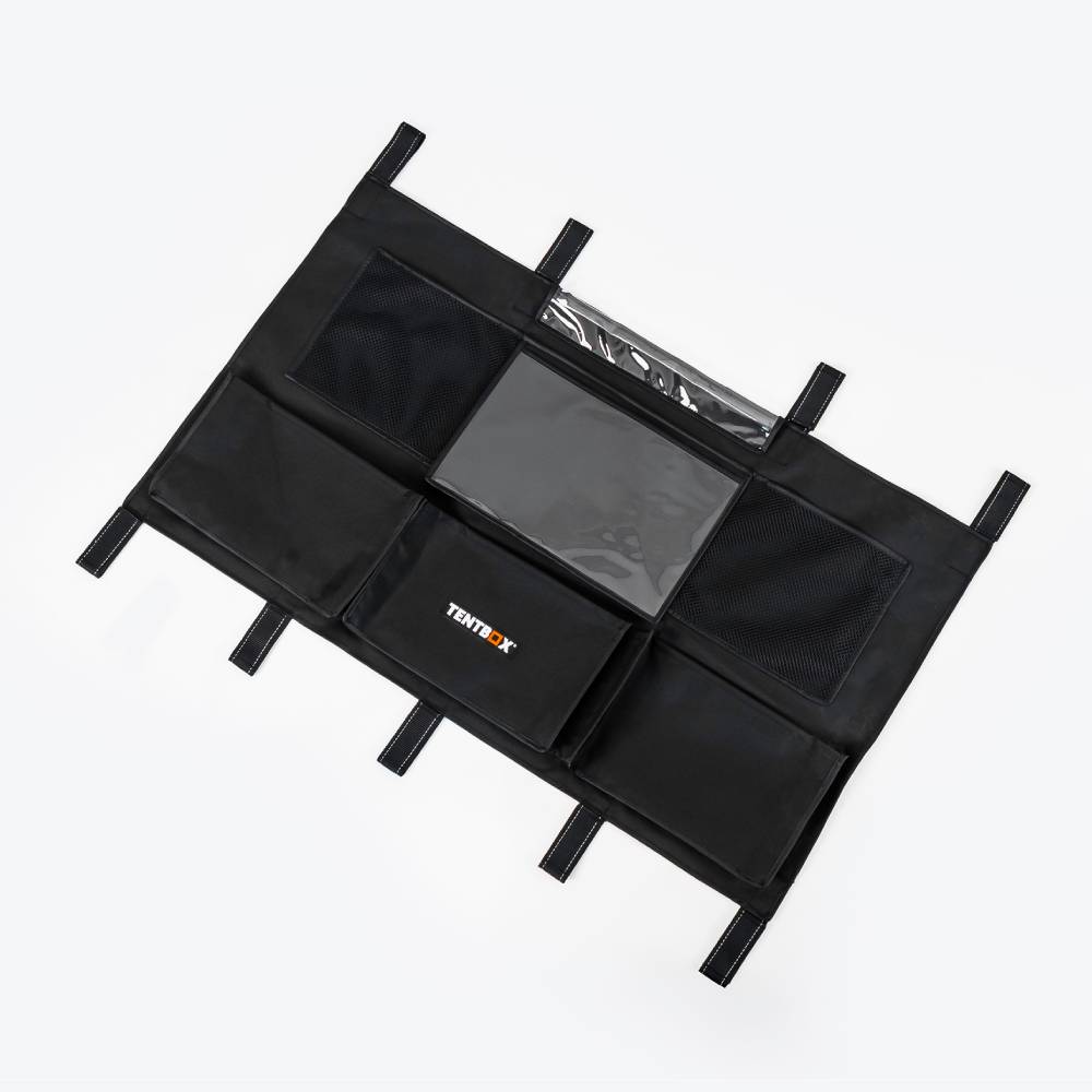 Black canvas TentBox Lite storage pockets with mesh and clear compartments, velcro-backed.