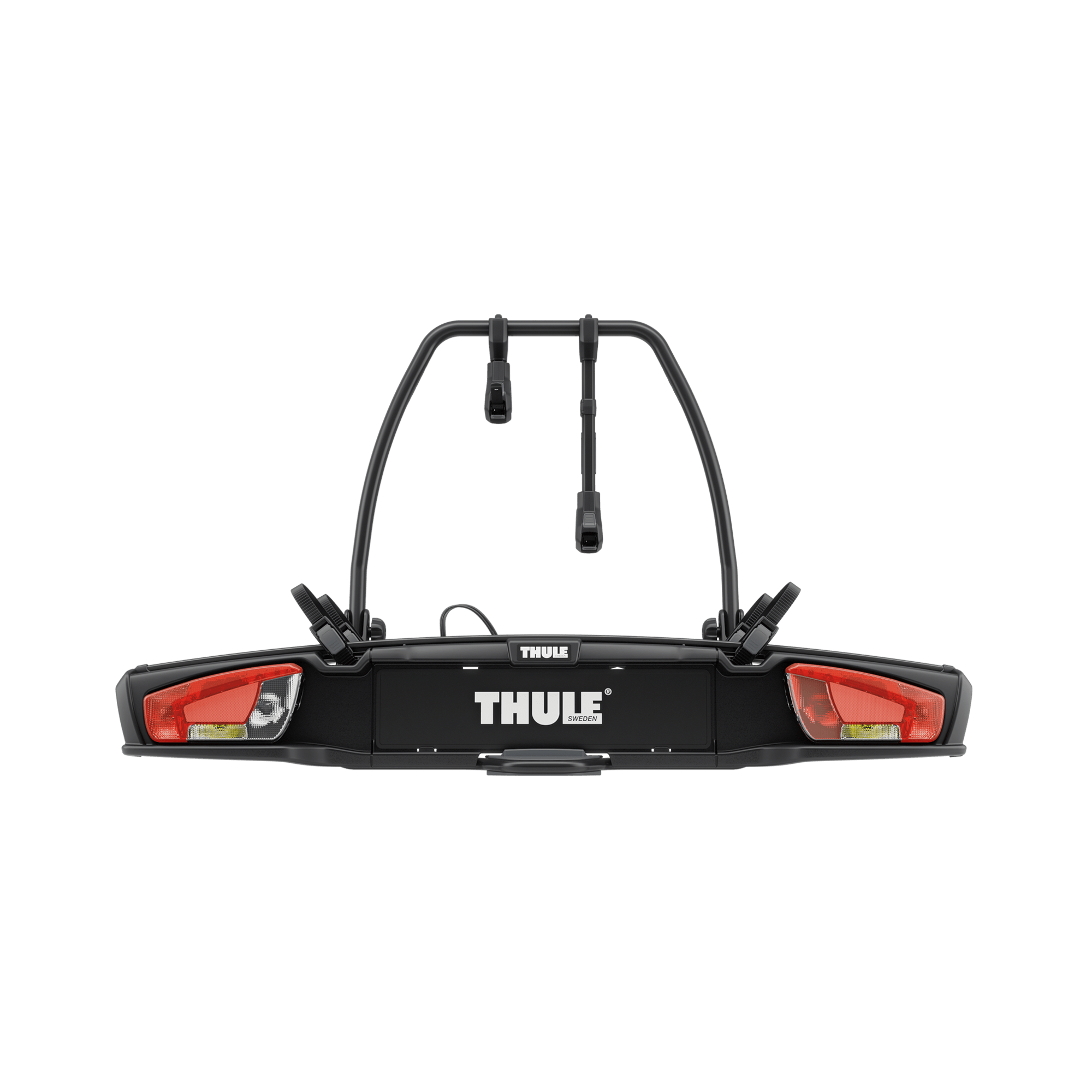 Black Thule VeloSpace 3 towbar-mounted bike rack for two bikes, featuring red taillights and a robust design.